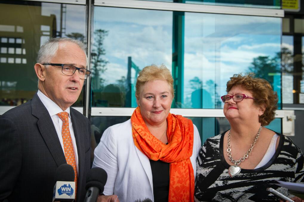Malcolm Turnbull, Gilmore MP Ann Sudmalis and registered user Merryn Joske at the launch of the new medical alarms register, which helps residents migrate the alarm service to the NBN. Picture: ALBEY BOND