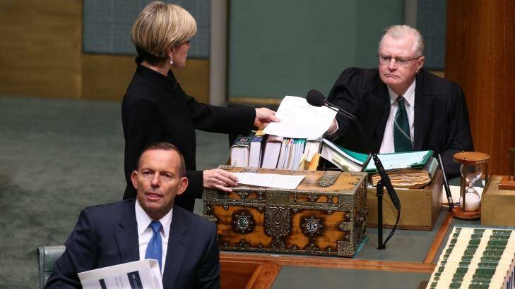 Foreign Affairs Minister Julie Bishop pictured on June 4 tabling a letter after adding to an answer on Man Haron Monis writing to Attorney-General Senator George Brandis. Photo: Andrew Meares