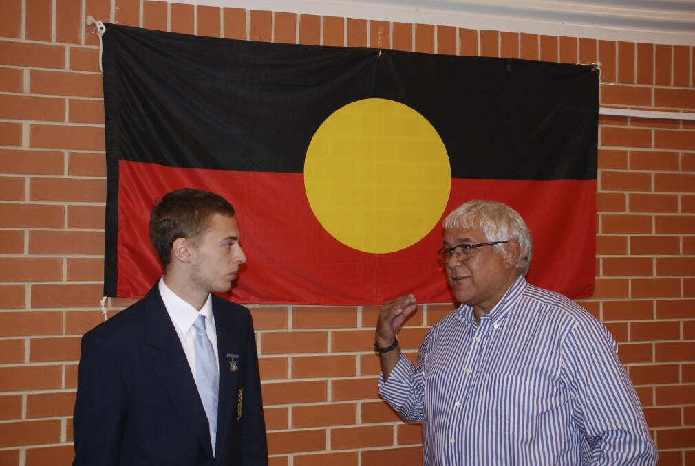 Australian Human Rights Commission Aboriginal and Torres Strait Islander Social Justice Commissioner Mick Gooda talks to Kiama High School year 12 student Luke Munro. Picture: BRENDAN CRABB