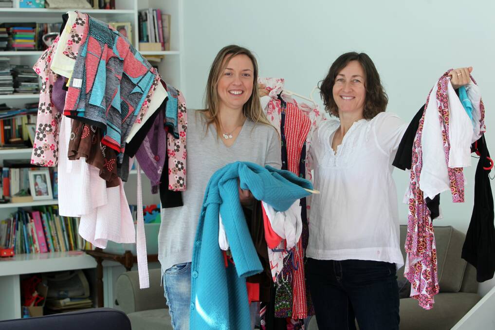Marie Bokulic and Anita Zubovic are running a Clothes Swap fund-raiser at Wollongong Public School to raise money and awareness for stopping human trafficking. Picture: GREG TOTMAN