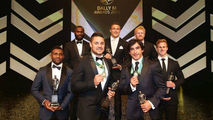 Jarryd Hayne and Johnathan Thurston pose with the Team of the Year at the Dally M Awards.  Photo: Matt King/Getty Images