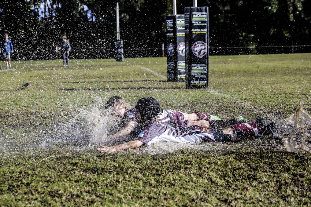 Damp: The Albion Park-Oak Flats junior rugby league club saw some wet weather action at the Croom Sporting Complex. Picture: GEORGIA MATTS