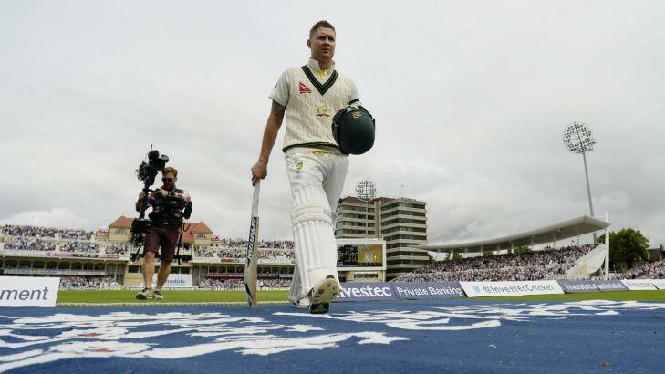 Off he goes: Michael Clarke leaves the field after being dismissed. Photo: Philip Brown