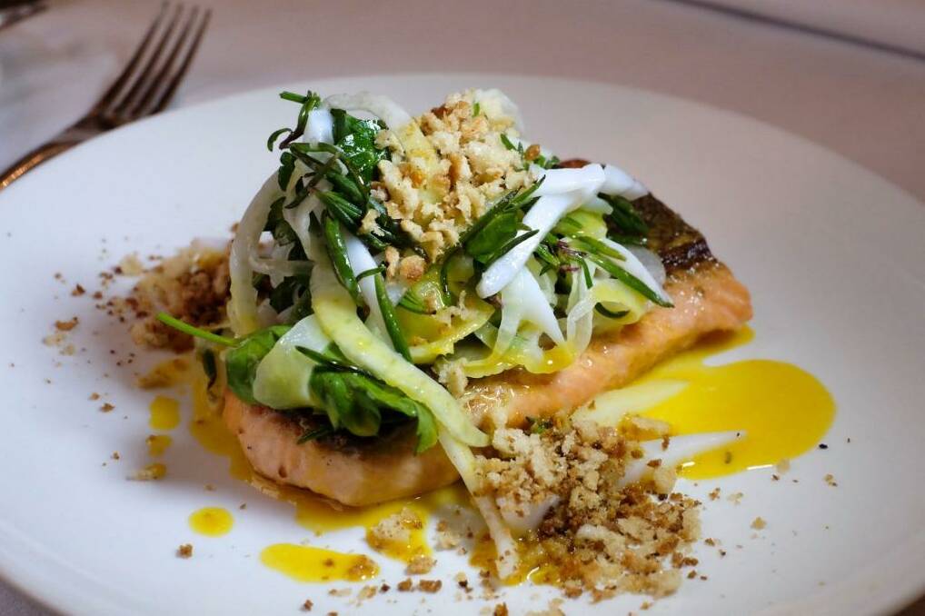 Trout with a fennel and cuttlefish salad, saffron and orange pangrattato. Photo: Vince Caligiuri/Getty Images