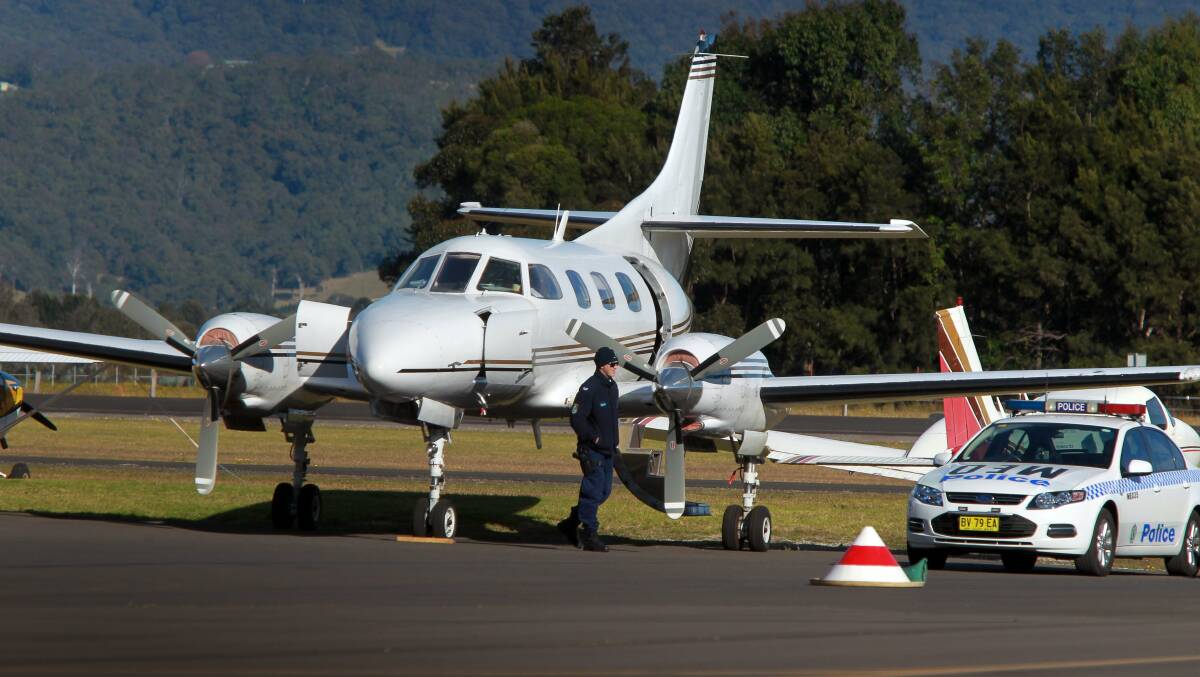 Police raided a plane at Illawarra Regional Airport in July 2014.