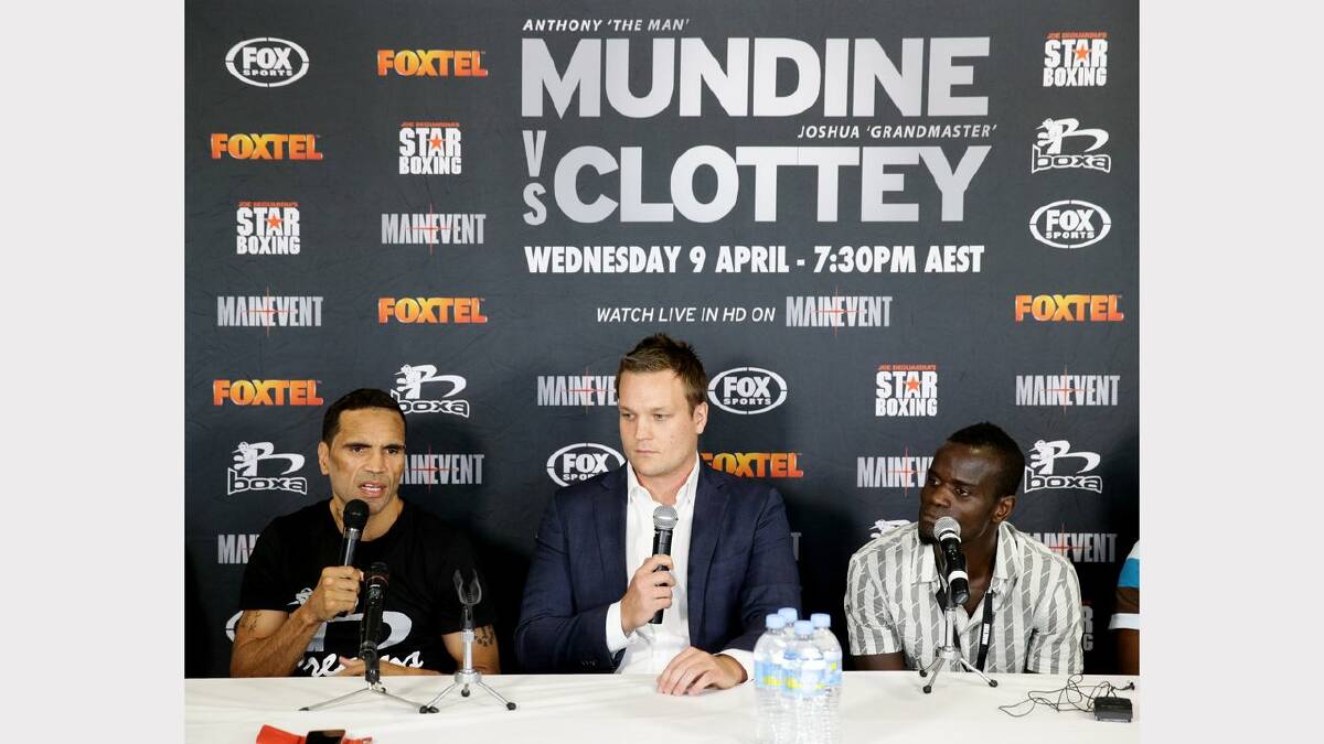 Anthony Mundine and  Joshua Clottey face the media at the Newcastle Entertainment Centre on Tuesday ahead of Wednesday's fight. Picture: Ryan Osland