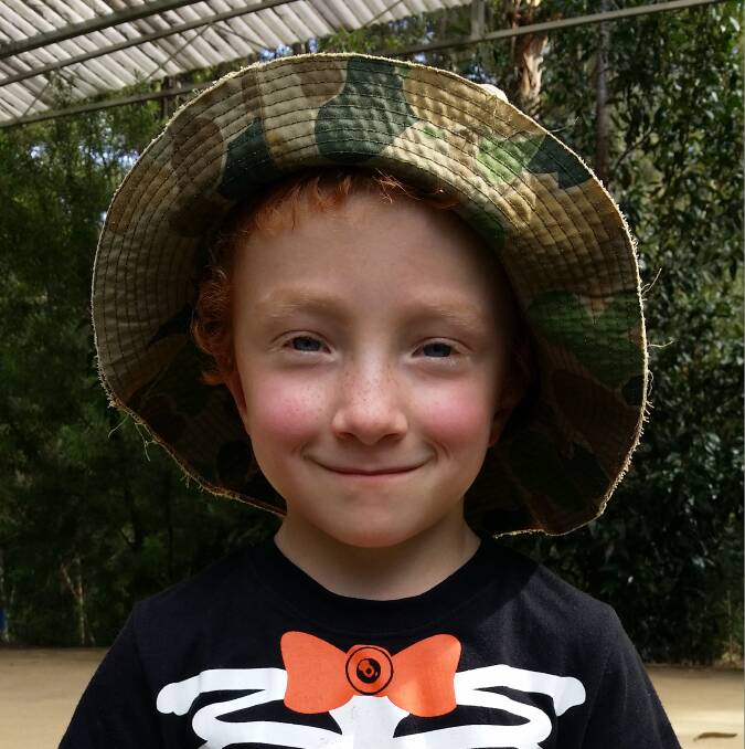 NESTING TIME: Lucian Muratroyd, aged 6, shows off the bird’s nest he made at the Eurobodalla Regional Botanic Gardens during the Easter school holidays.
