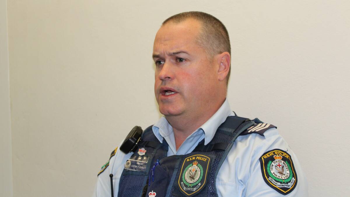 Acting Inspector Clifton Scarlett from the Far South Coast Local Area Command speaks to the media at Eden Police Station on Monday night.
