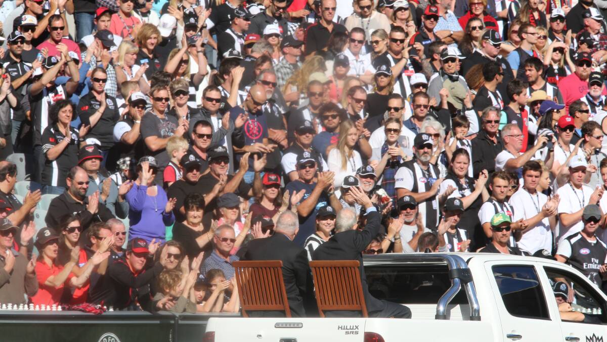Fans at the Collingwood vs Essendon game at the MCG. Photo: Wayne Taylor, The Age. 