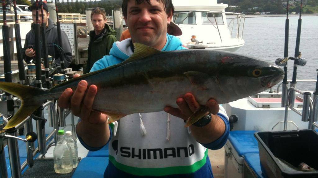 NAROOMA CHARTERS: Chris Dass with his king caught on Sunday with Narooma Charters. (9/4/14)