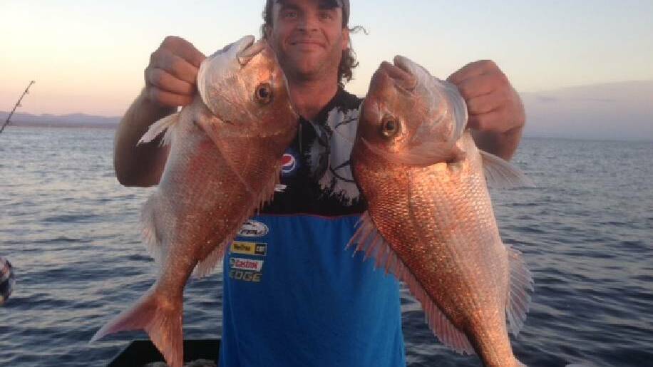 SECRET SNAPPER: With the no tide at the island on the weekend, Wazza and Simon of Lighthouse Charters decided to head north to a secret snapper location and put smiles on the punters faces with some nice Reddies!
Pictured is Johno of Canberra with his catch. (5/3/2014)
 