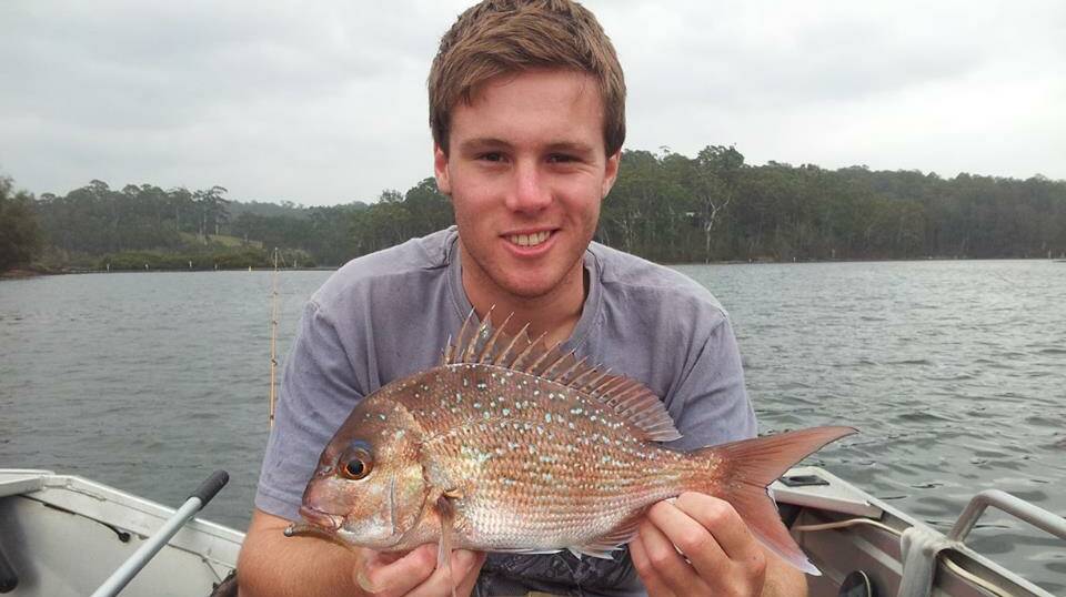 INLET SNAPPER: Alex Krantz with a decent Wagonga Inlet snapper taken on a small 80mm bloodworm wriggler. (13/2/2014).