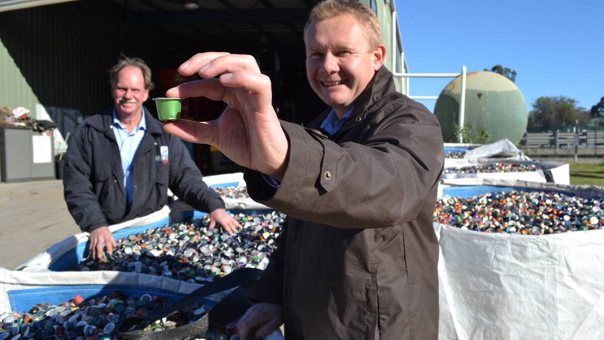 Southern NSW manager Dave Galloway with Steve Martin, who is taking over the running of the West Nowra site, with just a small amount of the coffee pods to be recycled at the Sell & Parker coffee pod recycling site in Nowra. 