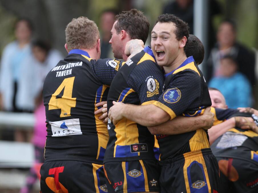 LION TAMERS: Nowra-Bomaderry Jets five-eighth Steve Brandon and his team mates celebrate their nail-biting victory over defending premiers Gerringong at Nowra Showground on Saturday. Photo: DAVID HALL 