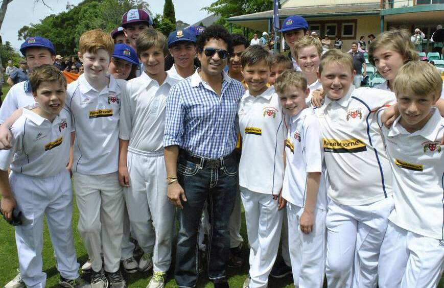 Indian cricket great Sachin Tendulkar meets a group of young Highlanders on Thursday at Bradman Oval. Photo by Josh Bartlett