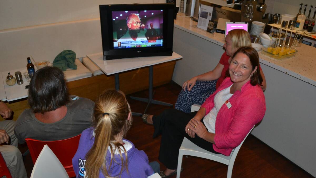 South Coast Labor candidate Fiona Phillips keeps up to date on the live election results at Huskisson's Kiosk.