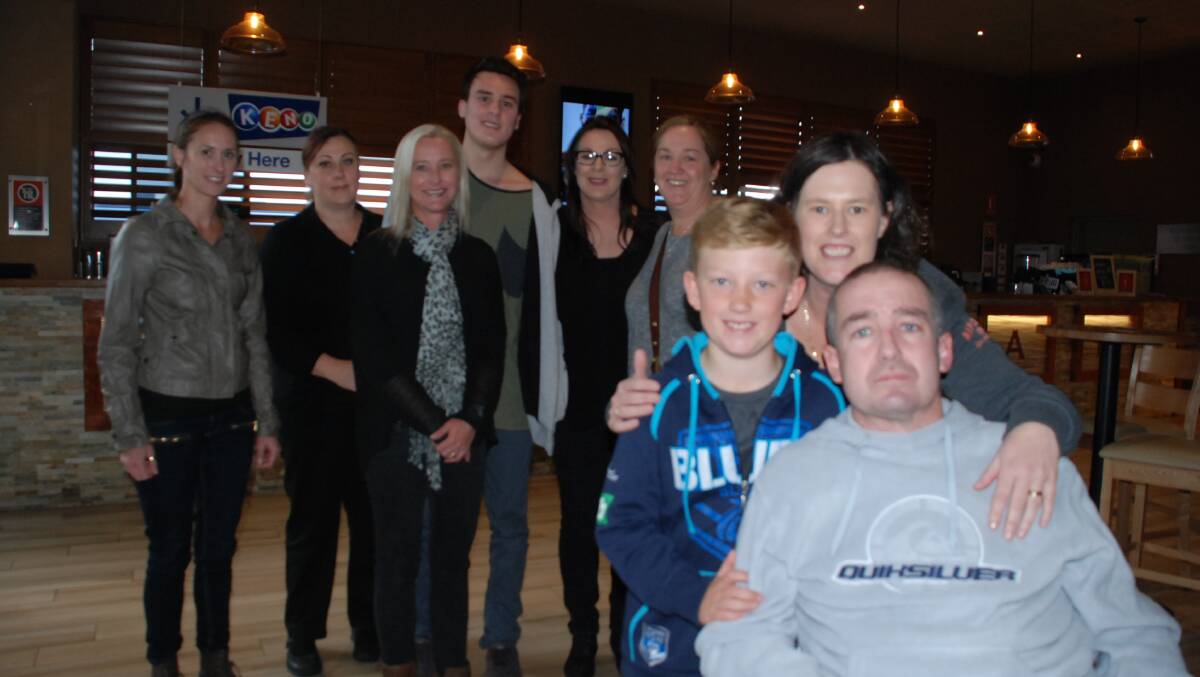 Darren 'Bud' Gottaas and his wife Karen and son Jed Gottaas with the Benefit for Bud fundraising event team Michelle Sandry, Belinda Bleimuth, Josh Katrivesis, Margot Batty, Jackie Katrivesis and Kristie O'Hara, Picture Eliza Winkler