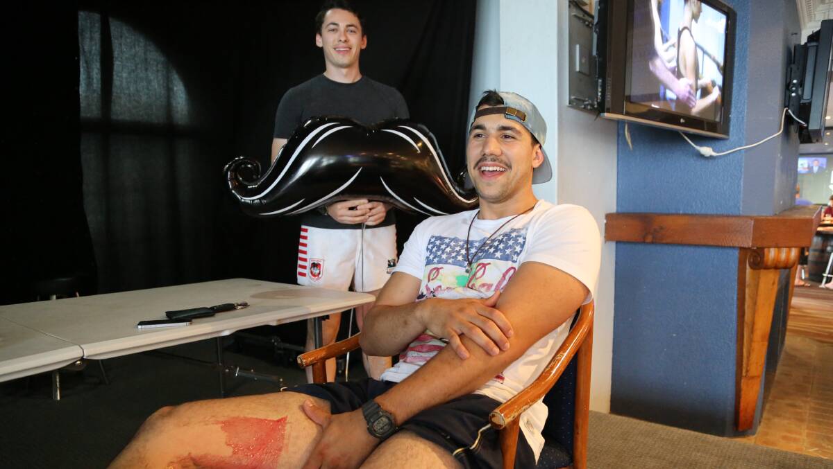 Shellharbour's David Bescos and Mark Jones do the leg wax challenge. Picture suplied