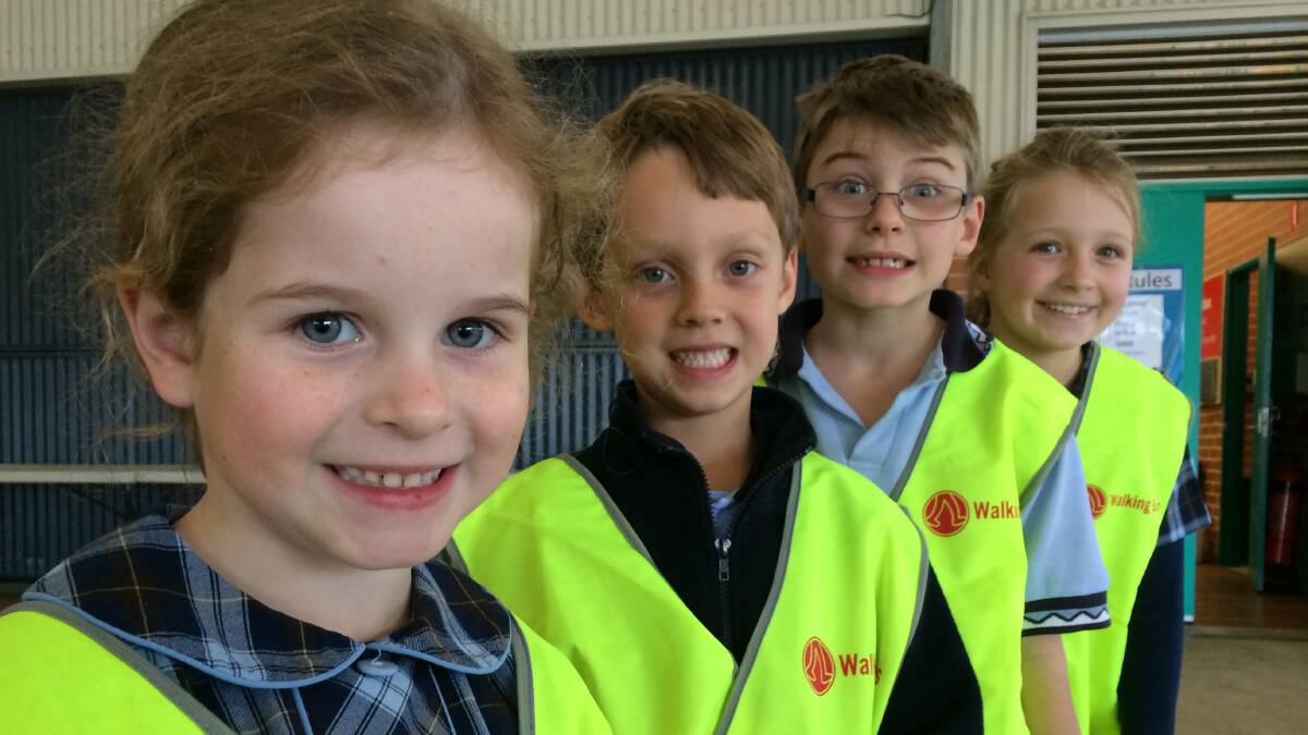 Shell Cove Primary School students Tahlia Griffiths, William Thomson, Harry Roache and Lucy Moore will participate in the Walking Bus. Picture Eliza Winkler
