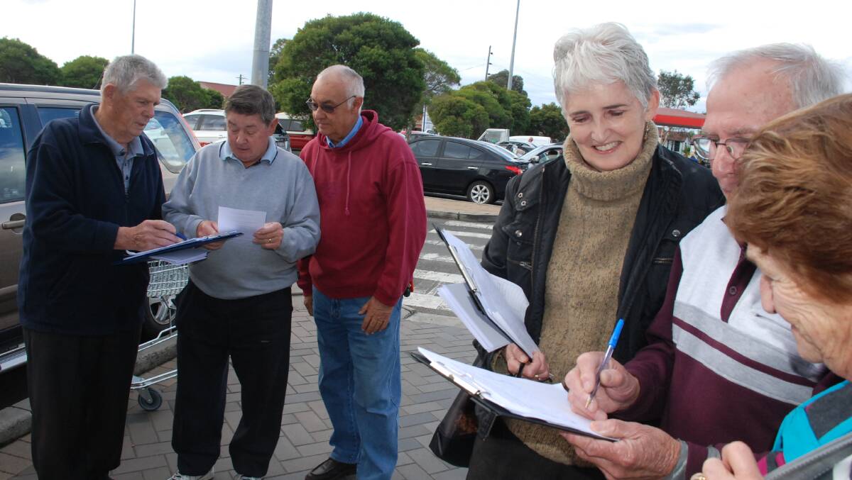CAPTION: Stop the Hub Community Group members, Diane Quinlin and Harry Gooden were at an Albion Park shopping precinct today to collect signatures against the Shellharbour City Hub development. Picture ELIZA WINKLER
