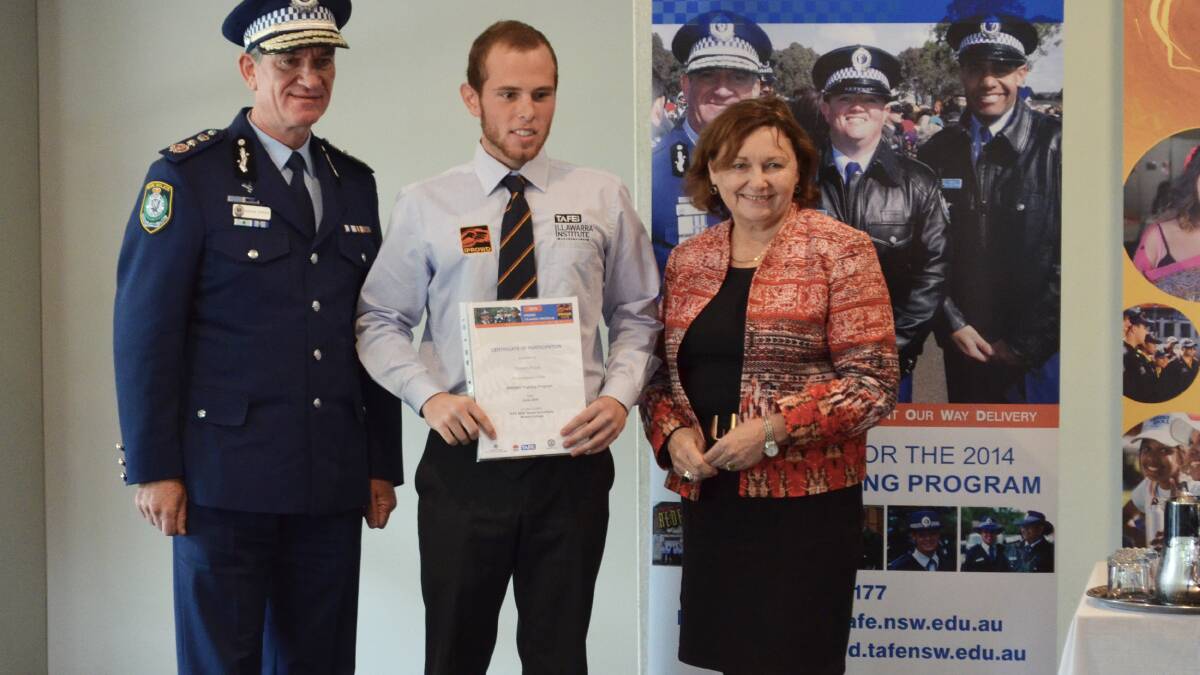 Lake Illawarra's Steven Poole accepting his graduation certificate with NSW Police Commissioner Andrew Scipione and TAFE Illawarra Institute Director Dianne Murray.
