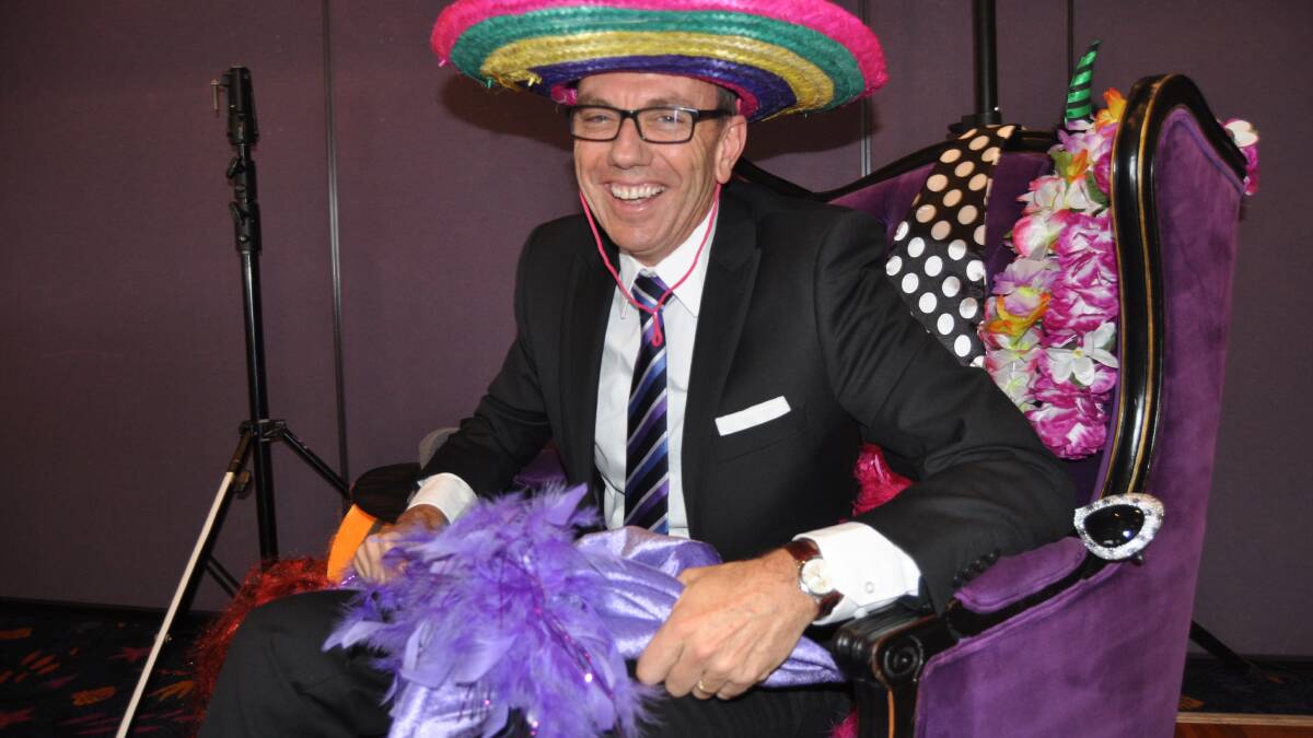 Warrigal CEO Mark Sewell sits at the colourful Warrigal chair which promotes Warrigal's philosophy and encourages people to be happy and be them-self. Picture Eliza Winkler