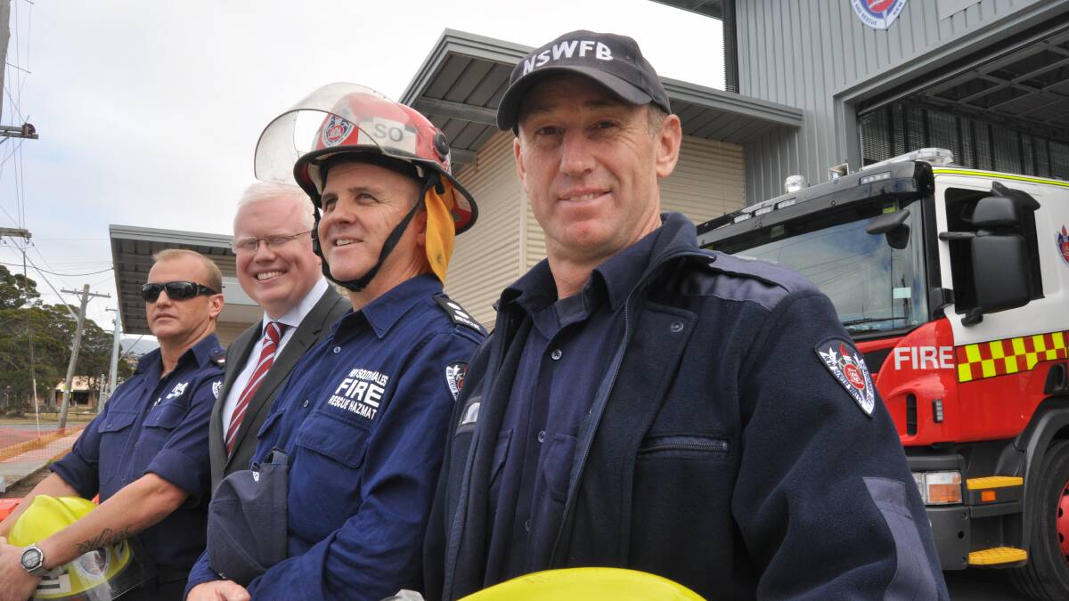 Senior firefighter Scott Noakes, Albion Park Fire Station Commander Dennis Cornell, Kiama MP Gareth Ward and senior firefighter Josh Ford opened the doors to the new $2.5 million Fire and Rescue facility at Albion Park on Thursday. Picture Eliza Winkler