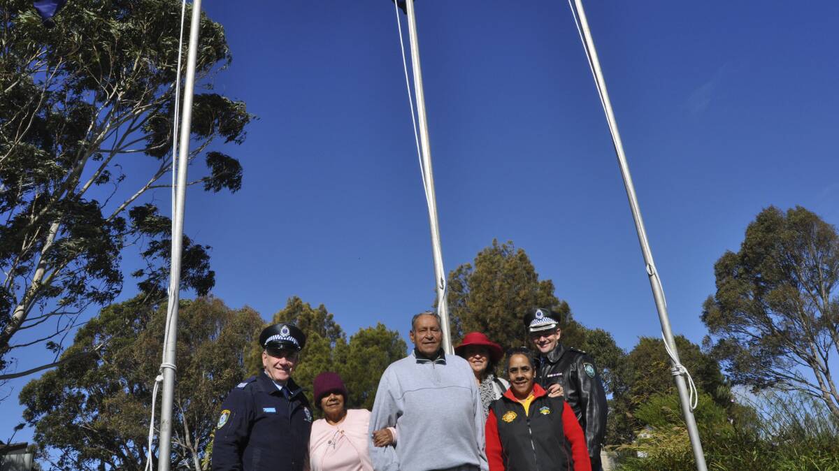 Lake Illawarra Local Area Command senior constable Mark Scott, Barrack Heights Round Table members Adelaide Wenberg, Uncle Bruce Olive, Aunty Lindy Lawler and Donna Brotherson and LILAC Commander Superintendent Wayne Starling at Shellharbour City Council’s NAIDOC Week event. Picture: PHIL MCCARROLL