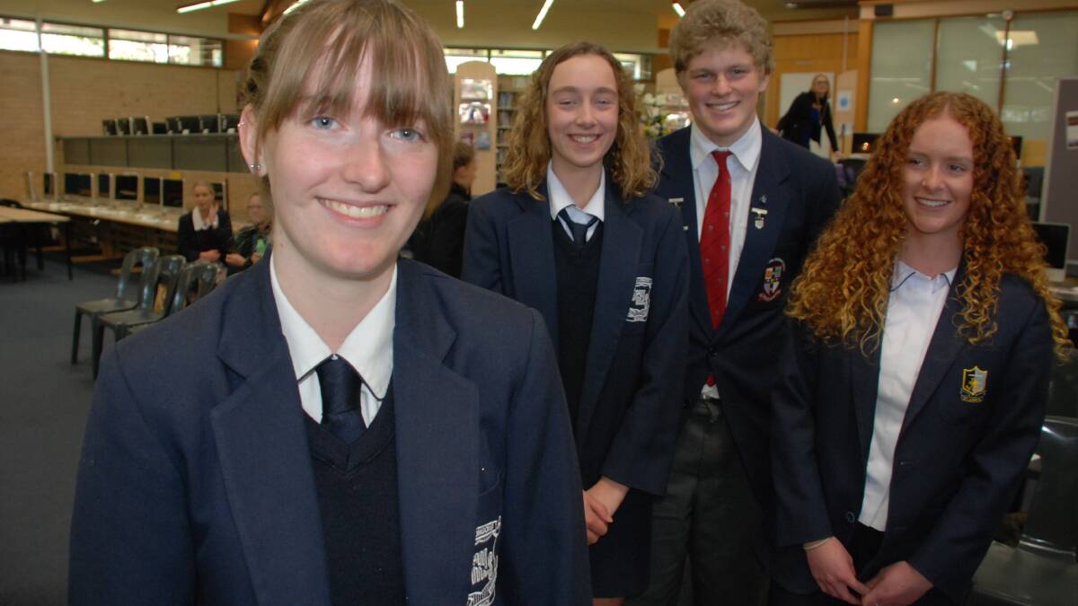 First prize winner at the Literary Lunch at St Josephs Catholic High School went to Louise Ellsmore from Smiths Hill (front) and Dominic Mortimer from the Illawarra Grammar School, Mahalia Crawshaw from Smiths Hill and Holly Small from St John the Evangelist. Picture Eliza Winkler