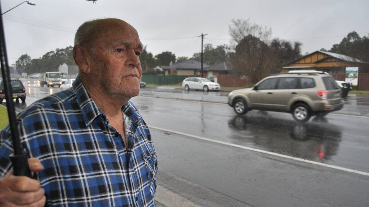 Albion Park Rail resident Noel Paine does not see the point in building another petrol station along the Princess Highway. Picture Eliza Winkler