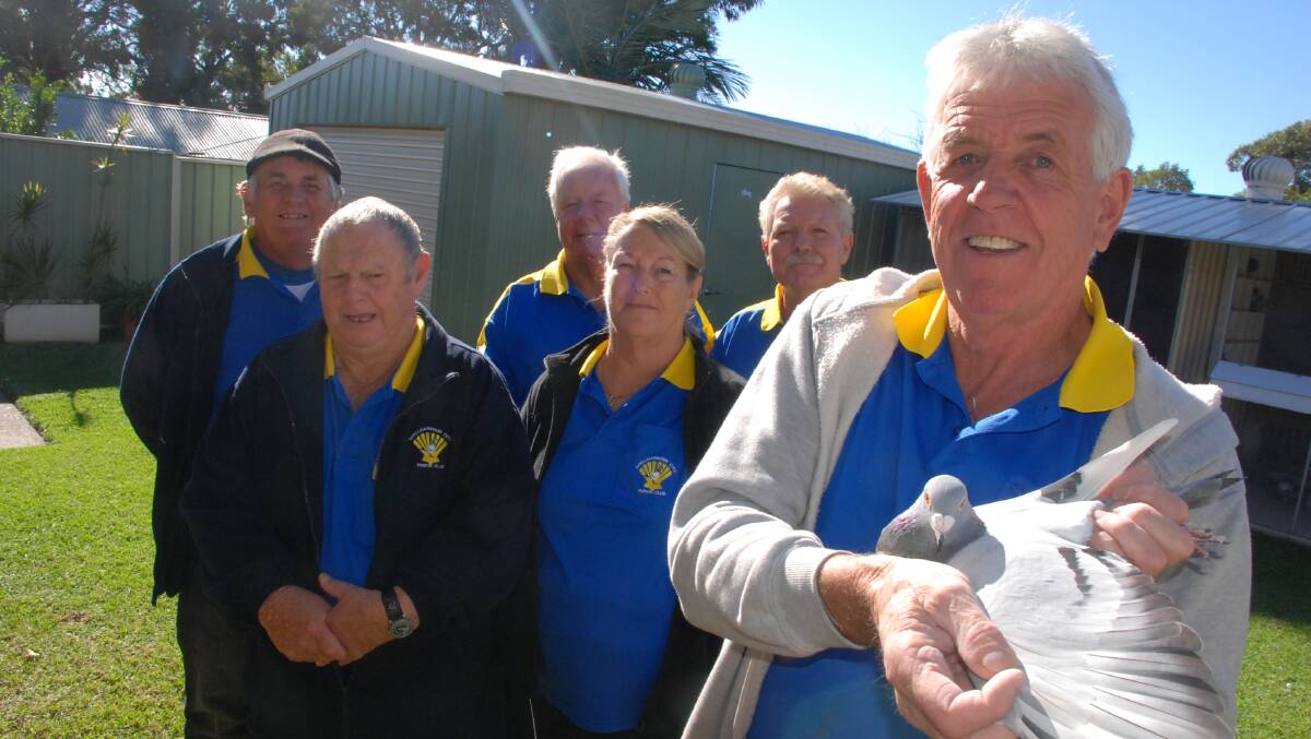 Shellharbour Pigeon Club members Paul Breeze (front) with Kathy Breeze, Peter Clarke, David Thompson, Robert Hodgson and Ron Bird celebrate 60 years. Picture Eliza Winkler