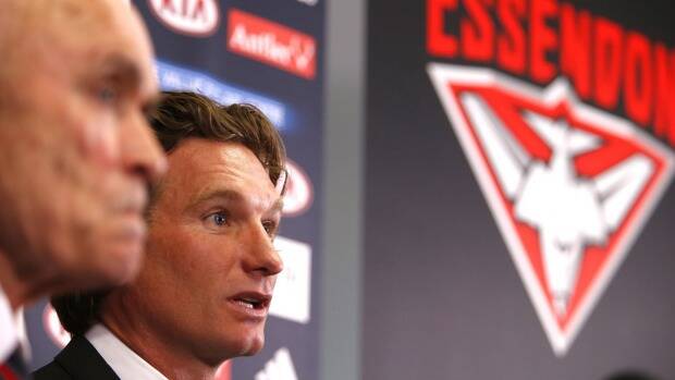 Essendon coach James Hird and CEO Paul Little at Tuesday's media conference. Photo: Eddie Jim