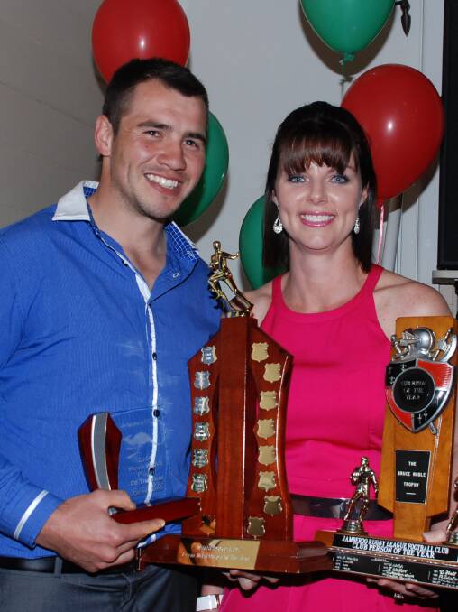 Robbie Noble and Denise Sawtell show off their well deserved trophies they took out at  Jamberoo Superoos presentation on Friday night.
