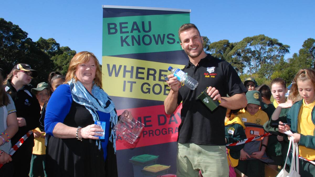 Shellharbour City Mayor Marianne Saliba and Footy Show's Beau Ryan launch the new waste recycling initiative at Blackbutt Reserve. Picture: DAVID HALL