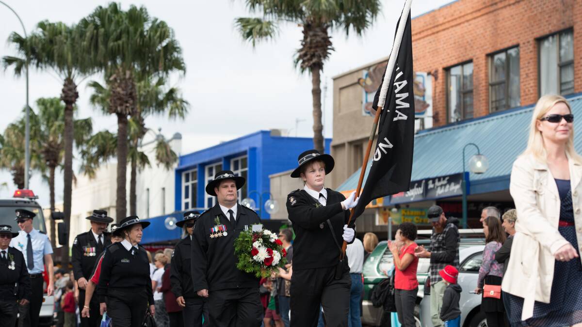A combination of community groups, schools and services joined together for the Anzac Day March, watched by thousands along Manning and Terralong Streets.