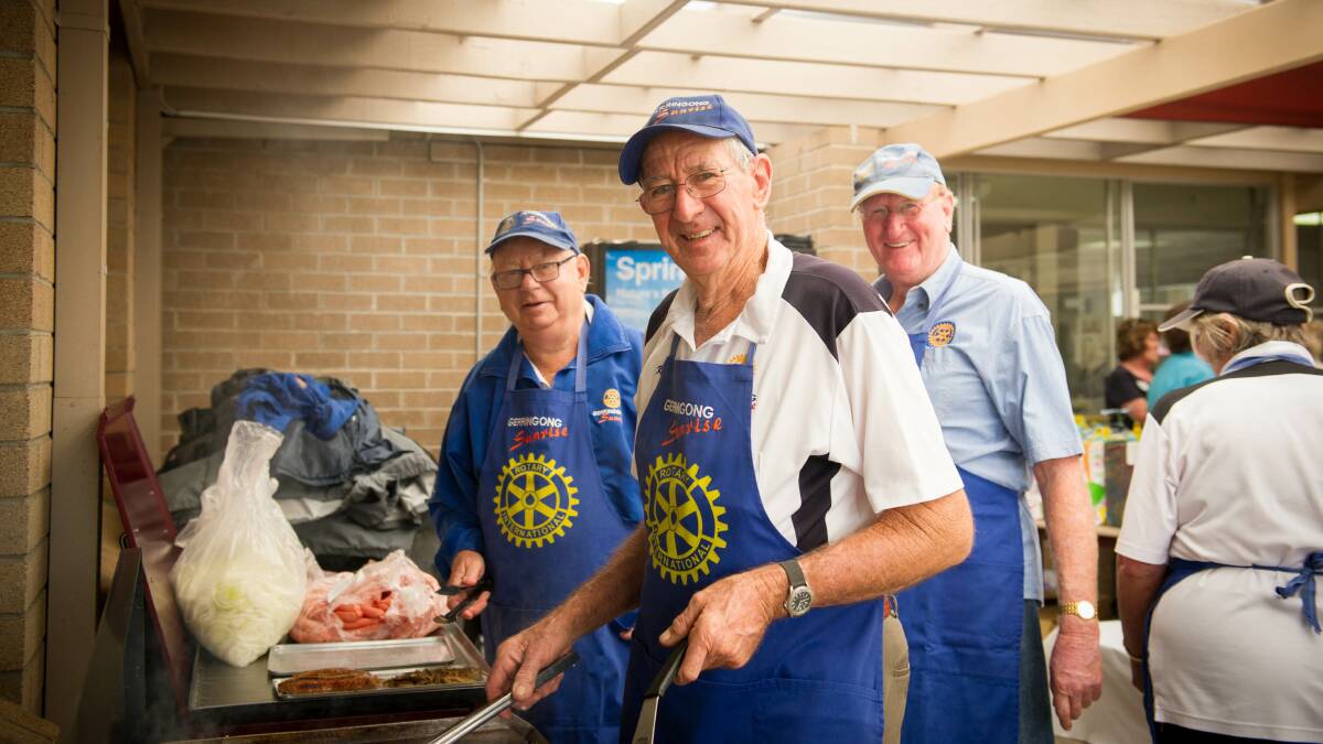 Brian Burgess, Tim Lawrence and Kevin O'Sullivan on barbecue duty. Picture: ALBEY BOND
