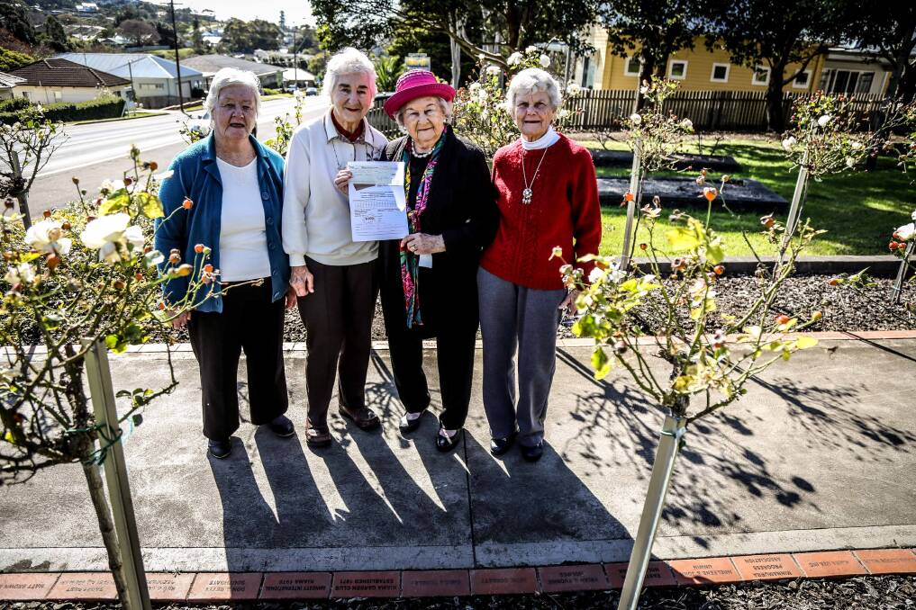 Members of Kiama Uniting Church Ruth Weise, Gail Pickles and Marie Bone with Winsome Barker (second from right) at Peace Park. Picture: GEORGIA MATTS