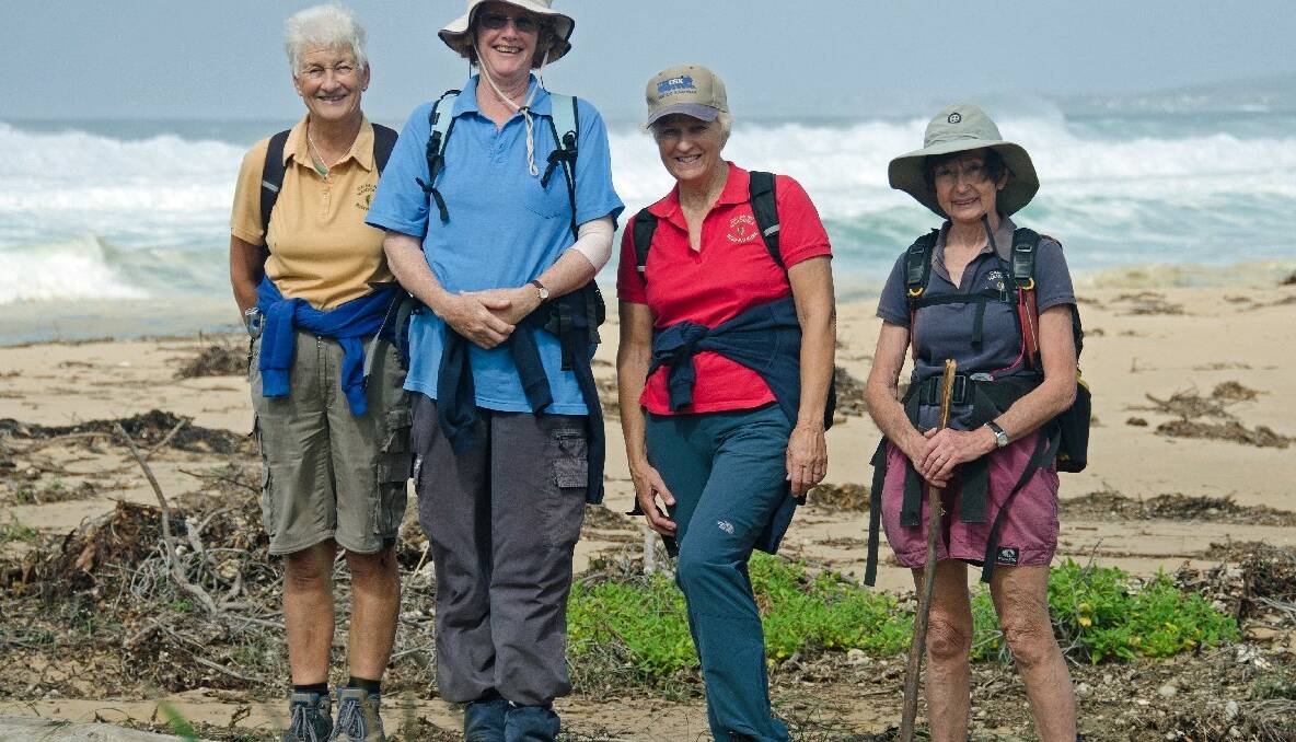NAROOMA: Dalmeny Narooma Bushwalkers on Brou Beach on Saturday. Standing left to right, are Jo Jean-Mairet, Maggie Finch, Beris Jenkins and Kerren Ogg.