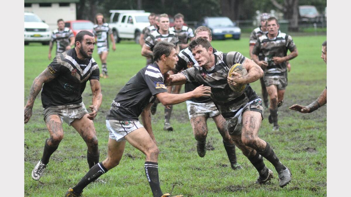BERRY: Berry Magpies captain coach Nathan Benney brushes Port Kembla’s Josh Maude aside during their 30-4 victory on Saturday. 