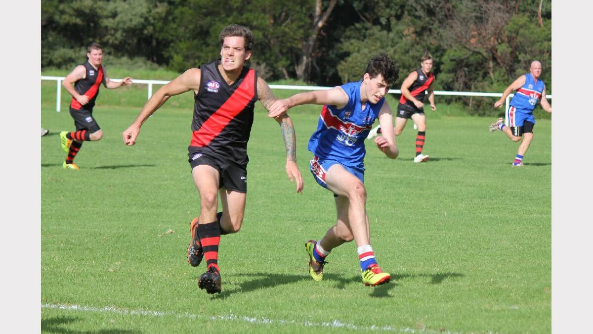 BEGA: Bomber Nathan Carpenter (left) gets in front of his Digger opponent in the chase for the ball on Saturday. 

