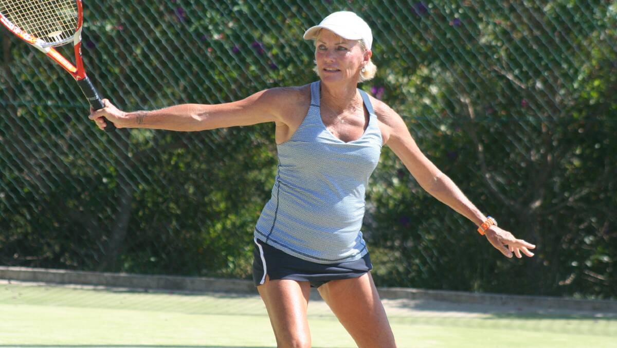 ULLADULLA: Adrienne Avis from Sydney reaches for a volley in the weekend's senior tennis competition that attracted competitors from all over Australia and even overseas.
 