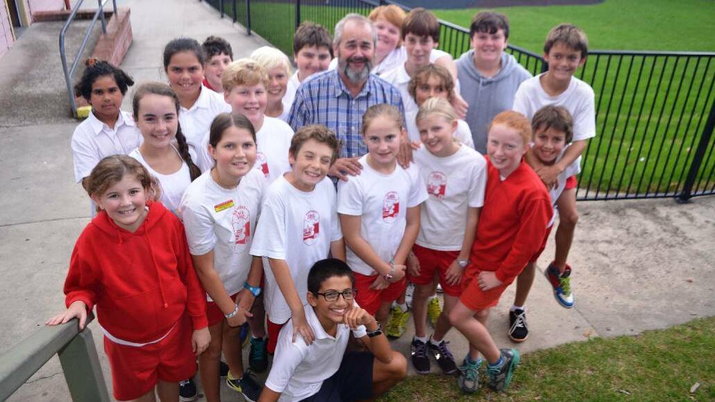 NAROOMA: Narooma Public School students caught up with retired teacher Mr Sloan, as school broke up for Easter holidays on Friday. There is a special farewell next month for Jon Sloan who spent 31 years at the school. 