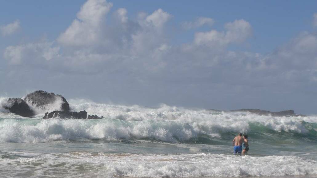 NAROOMA: Huge seas pounded the Narooma district over the weekend as the latest east coast low sulked off the coast. Narooma News editor Stan Gorton could not believe these German tourists having a swim at Mystery Bay on Sunday morning, begging them to get out! 