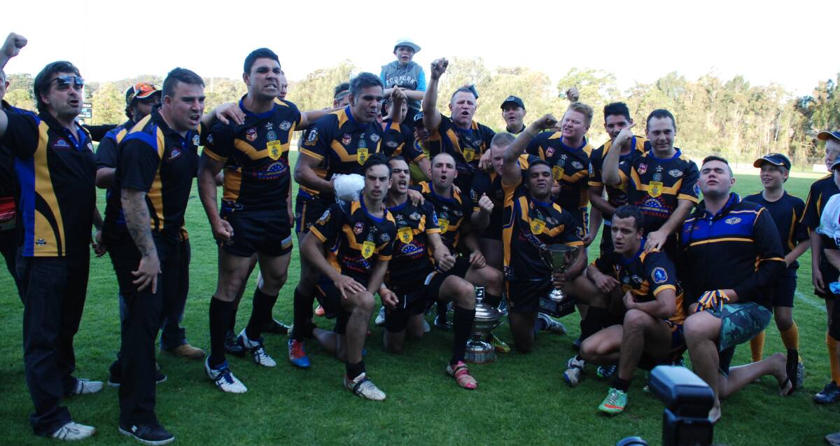 The Nowra-Bomaderry Jets celebrate winning the Group 7 Rugby League premiership.