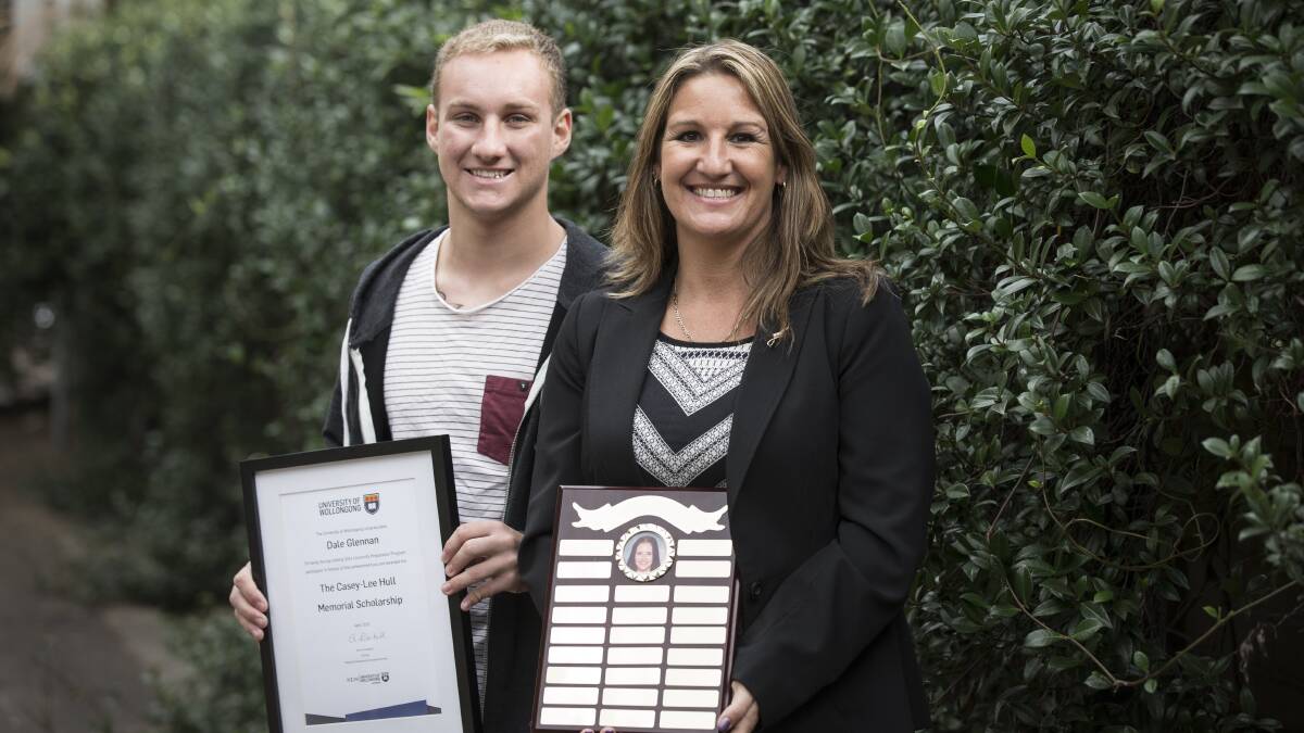 LEGACY: Shoalhaven High School graduate and current medicinal chemistry student at UOW Dale Glennan accepts the inaugural Casey-Lee Hull Memorial Scholarship, from her mother Vanessa Bourne.