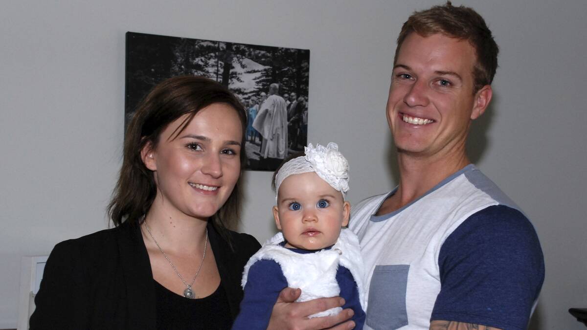  Brittney and Lachlan Whittaker with baby Ivy. Picture DAVID HALL