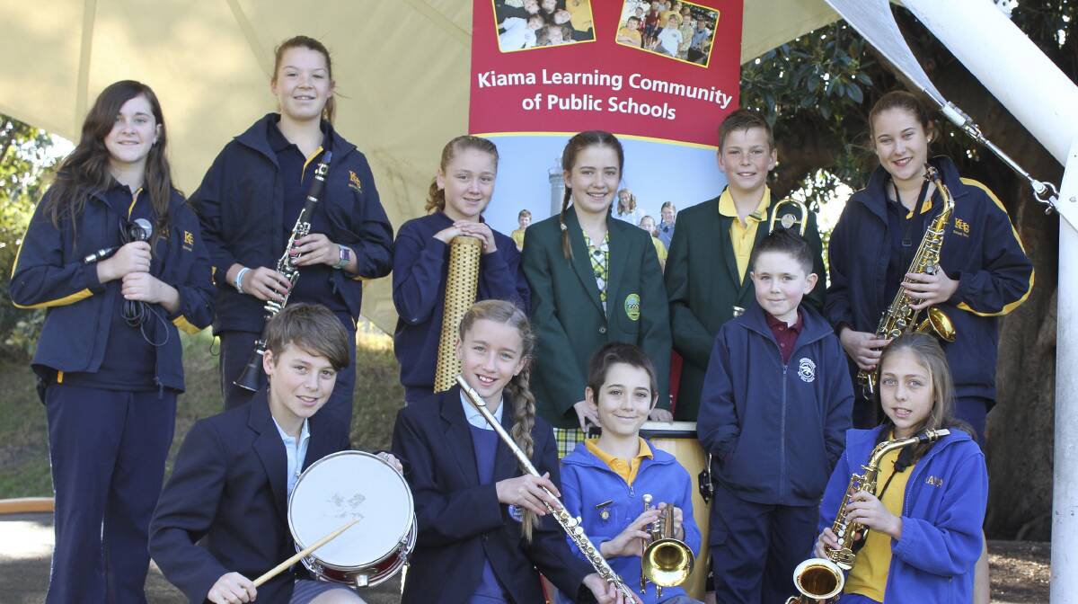 Let us entertain you - students from the Kiama Community of Schools (back) Sophia Borserio, Kara Mitchell, Mackensie Morris, Charli Parker, Will Webb, Olivia Burke (front) Thomas North, Annie Schweitzer, Jai Sala, Jacob Turnbull and Zephanie Koorey who are looking forward to celebrating Education Week with a concert in Hindmarsh Park on July 31. Picture: DAVID HALL