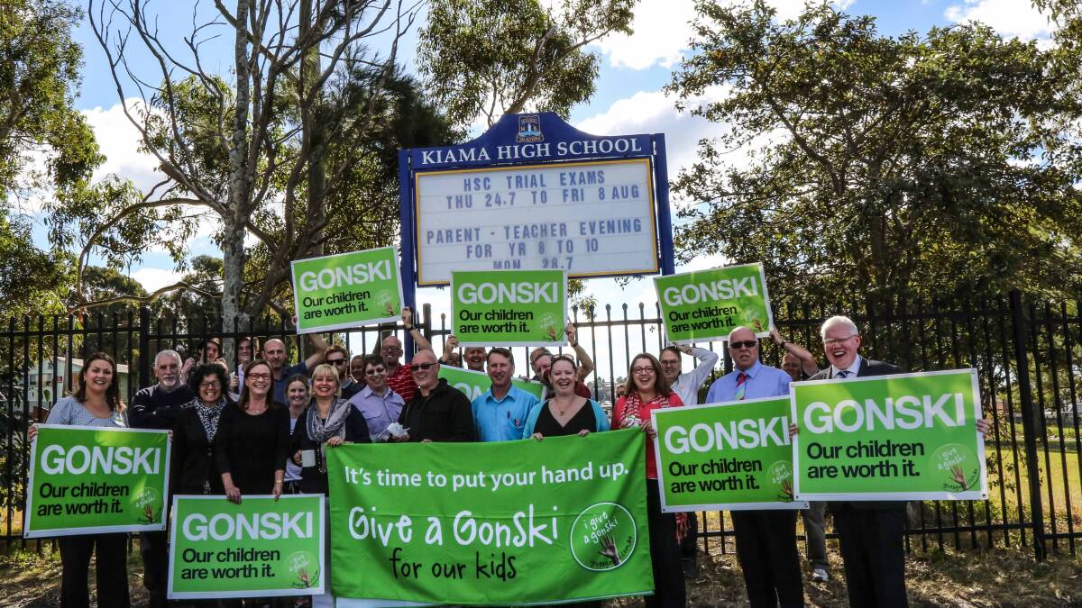 Kiama MP Gareth Ward, right, with teachers from Kiama High School expressing their support for the Gonski funding scheme. Picture: GEORGIA MATTS