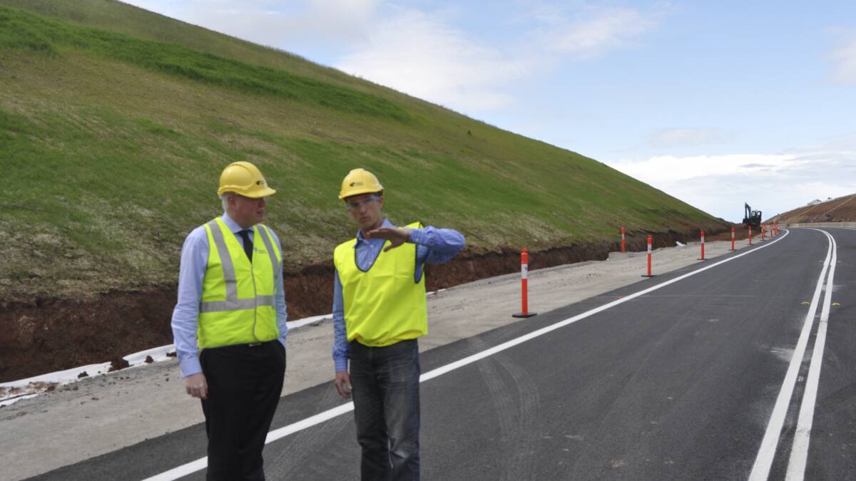 Kiama MP Gareth Ward and RMS project manager Adrian Rouse inspect the new works. Picture: BRENDAN CRABB 
