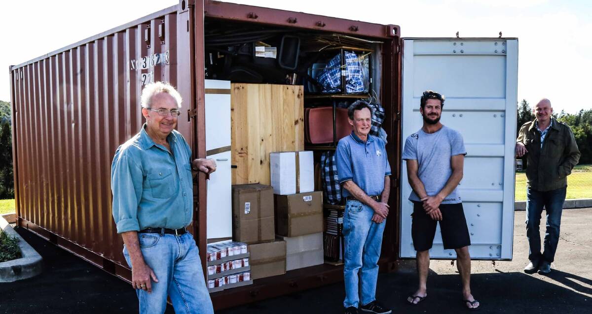 Les Moloney, Jay Maliphant, Marty Daniels and Shellharbour Community Church Pastor Shane Cook sending off their shipping container to Liberia. Picture: GEORGIA MATTS